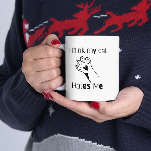 Embrace your feline friend's enigmatic charm with our "I think my cat hates me" 11 oz Coffee Mug! - Image 7